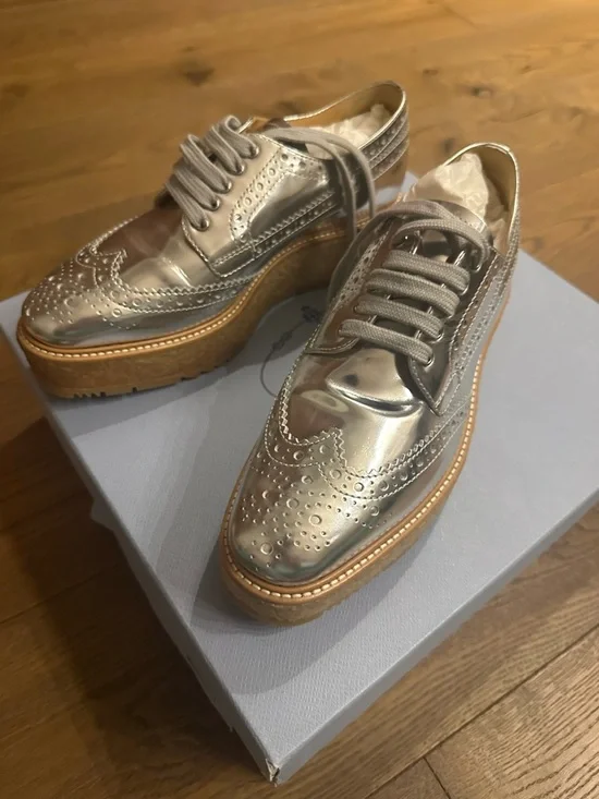 Prada Metallic Silver Wingtip Platform Loafers - Picture 2 of 8